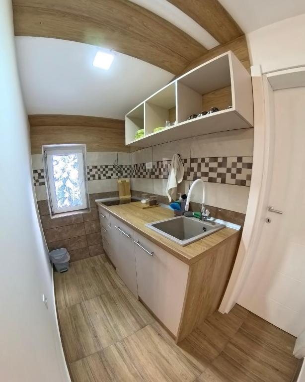 Eldhús eða eldhúskrókur á Nana Apartmani