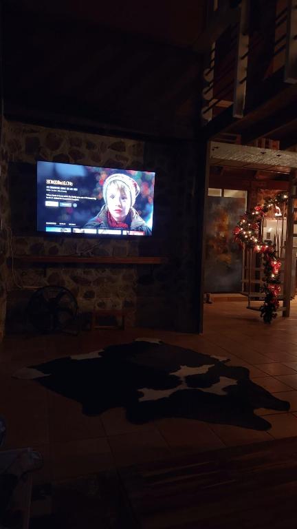 TV a/nebo společenská místnost v ubytování La Dama de los vientos