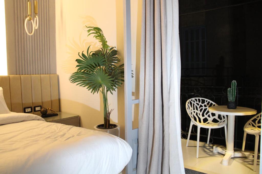 Postel nebo postele na pokoji v ubytování Elite Hotel