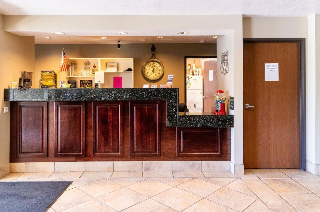 Kuchyň nebo kuchyňský kout v ubytování Scipio Hotel