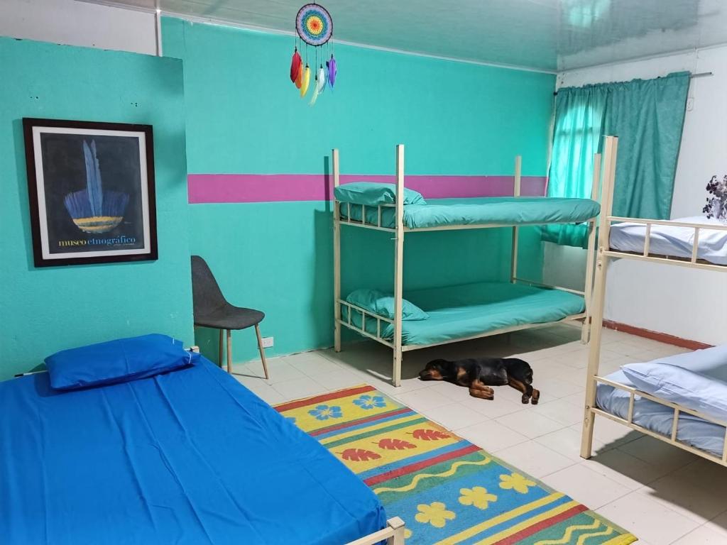 En eller flere senge i et værelse på SOL & SELVA Hostal Mocoa Putumayo