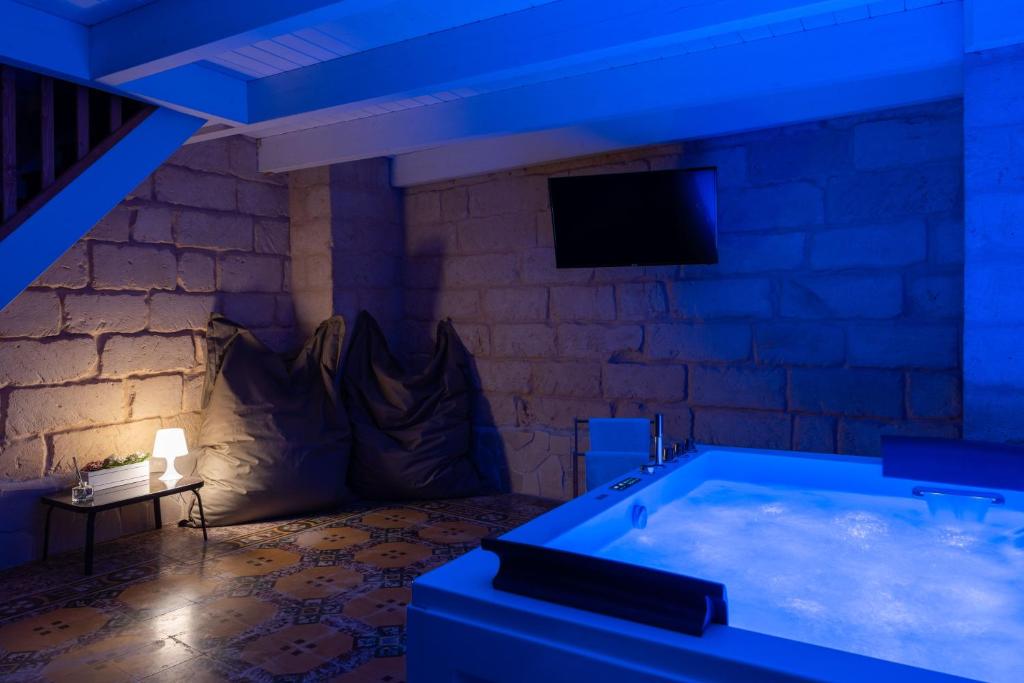 TV a/nebo společenská místnost v ubytování Victoria Luxury Suite