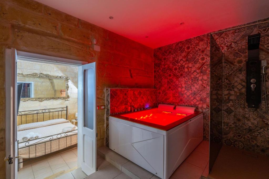 Postel nebo postele na pokoji v ubytování Victoria Luxury Suite