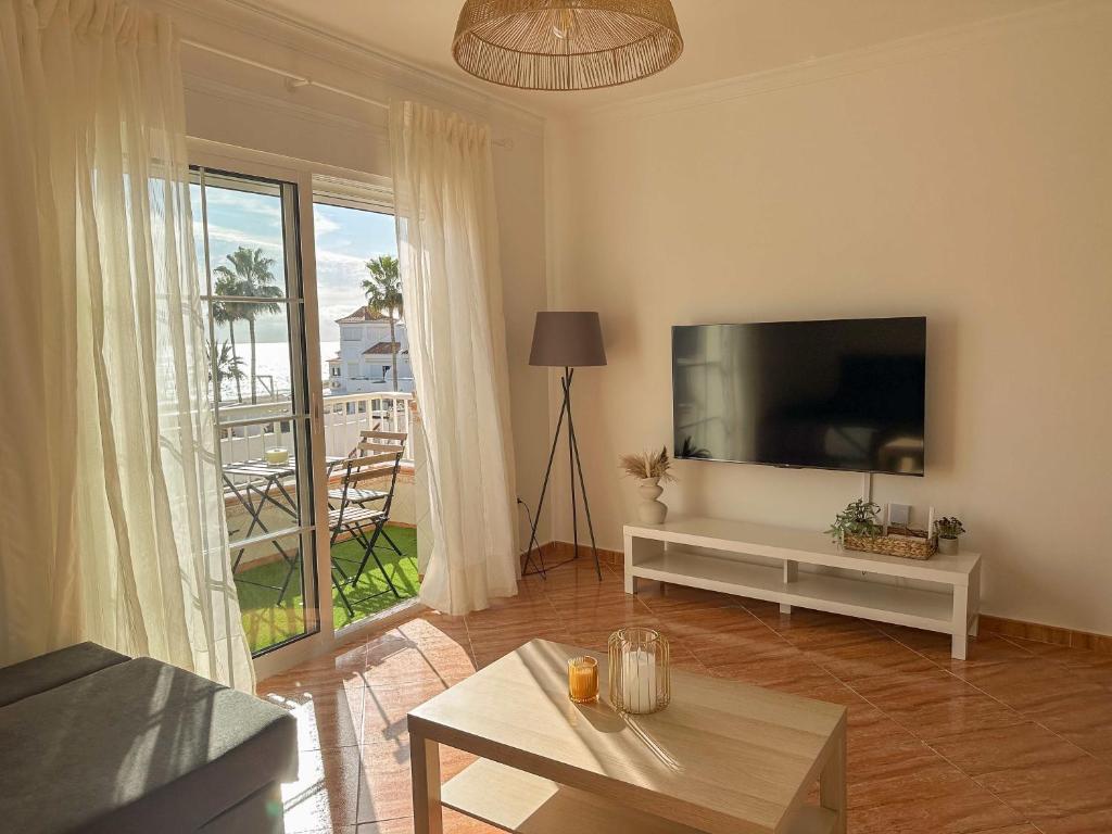TV a/nebo společenská místnost v ubytování Sea Apartment Cala de Mijas