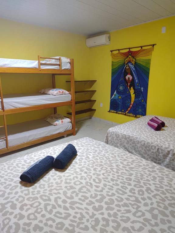 Postel nebo postele na pokoji v ubytování Paraíso Beach Hostel e Pousada