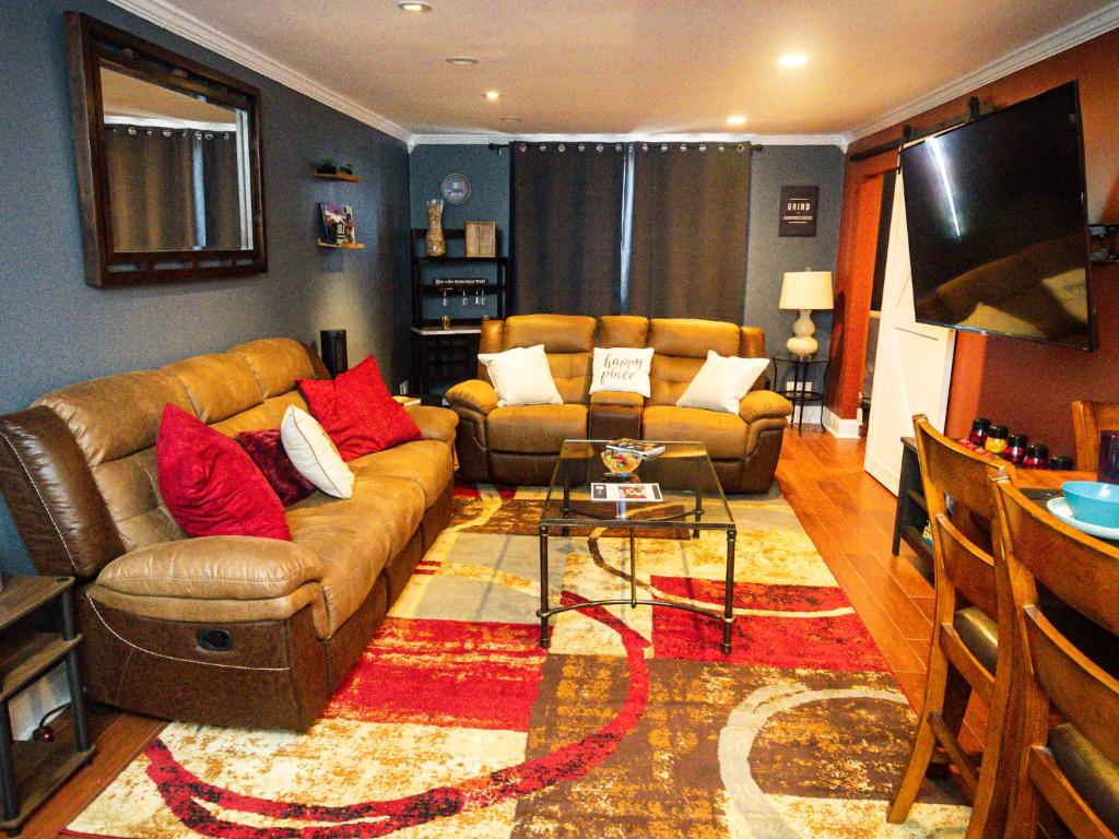 a living room with a couch and a table at Perfect DTWN 2BR Condo with King bed in Atlanta
