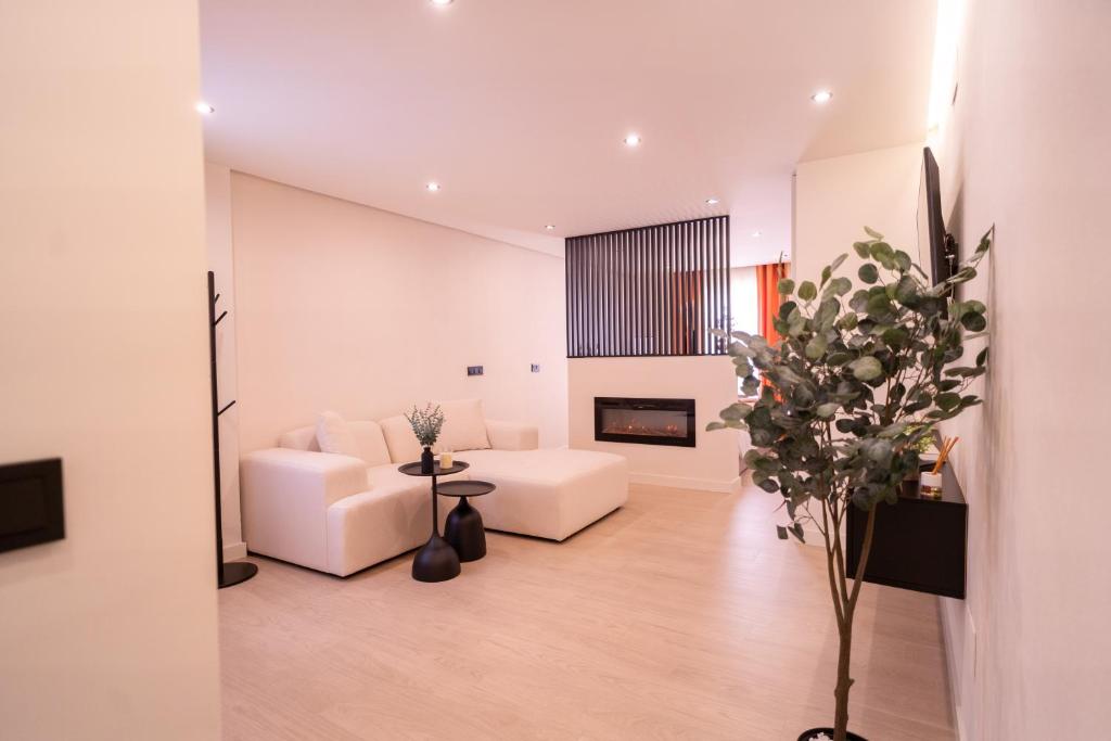 Postel nebo postele na pokoji v ubytování SERAN Apartamentos