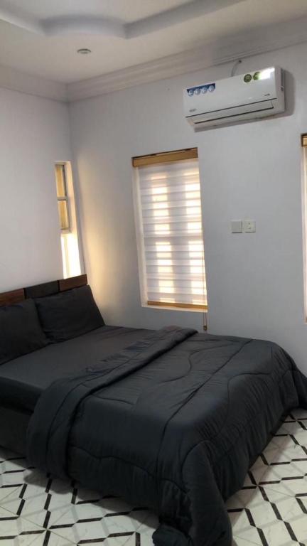 Postel nebo postele na pokoji v ubytování Luxuria Homes Ajah