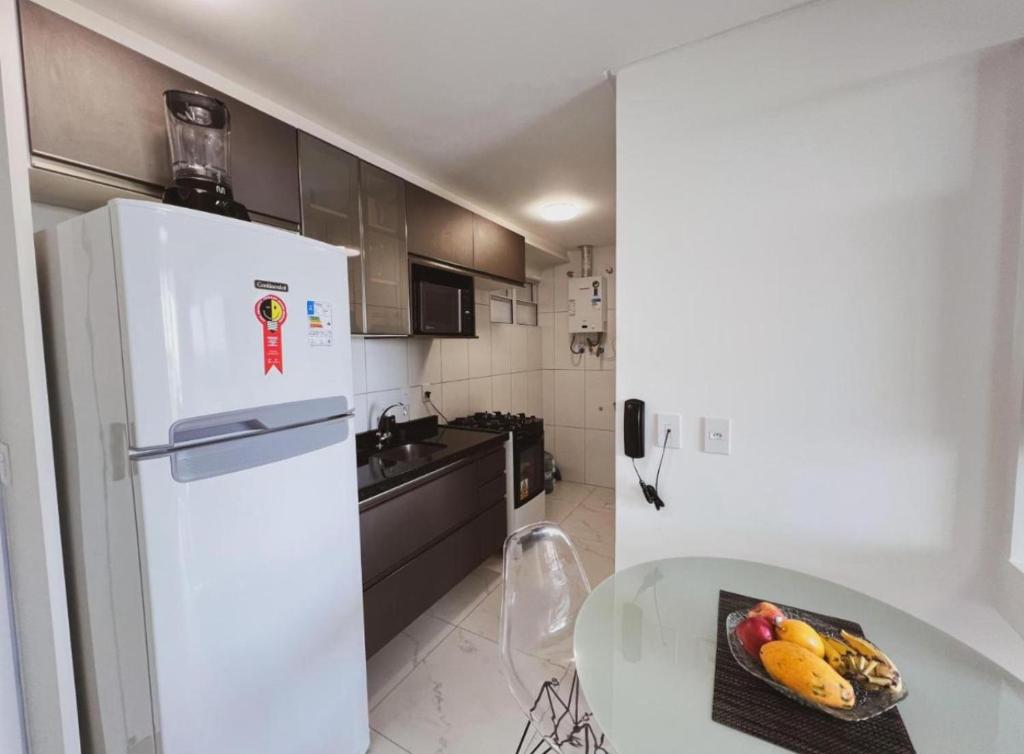 Η κουζίνα ή μικρή κουζίνα στο Flat frente mar