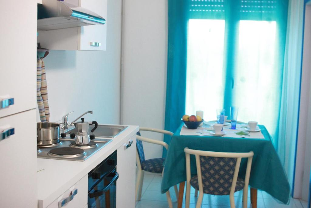Kuchyň nebo kuchyňský kout v ubytování Residence BluAdria