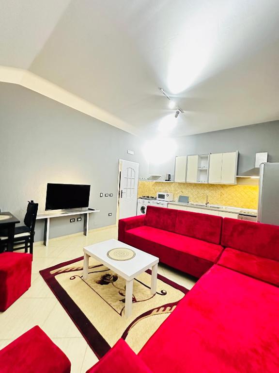 TV a/nebo společenská místnost v ubytování THE DOMI Apartments