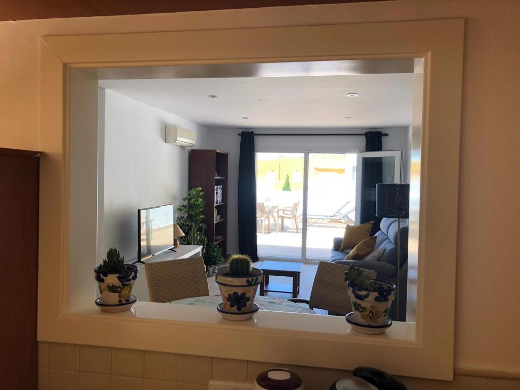 A seating area at Casa Veratense Atico Vera Naturista is 100 feelgood in Vera Playa