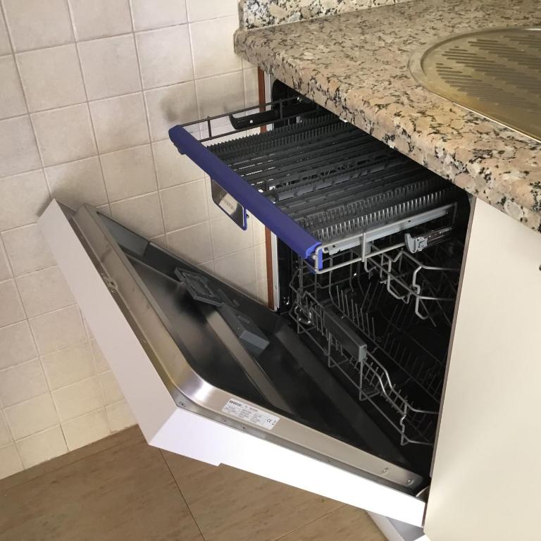 A kitchen or kitchenette at Casa Veratense Atico Vera Naturista is 100 feelgood in Vera Playa