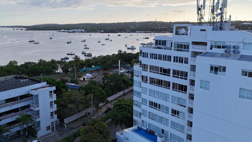 an apartment building with a view of a body of water at Bahía Fragata 803A in San Andrés