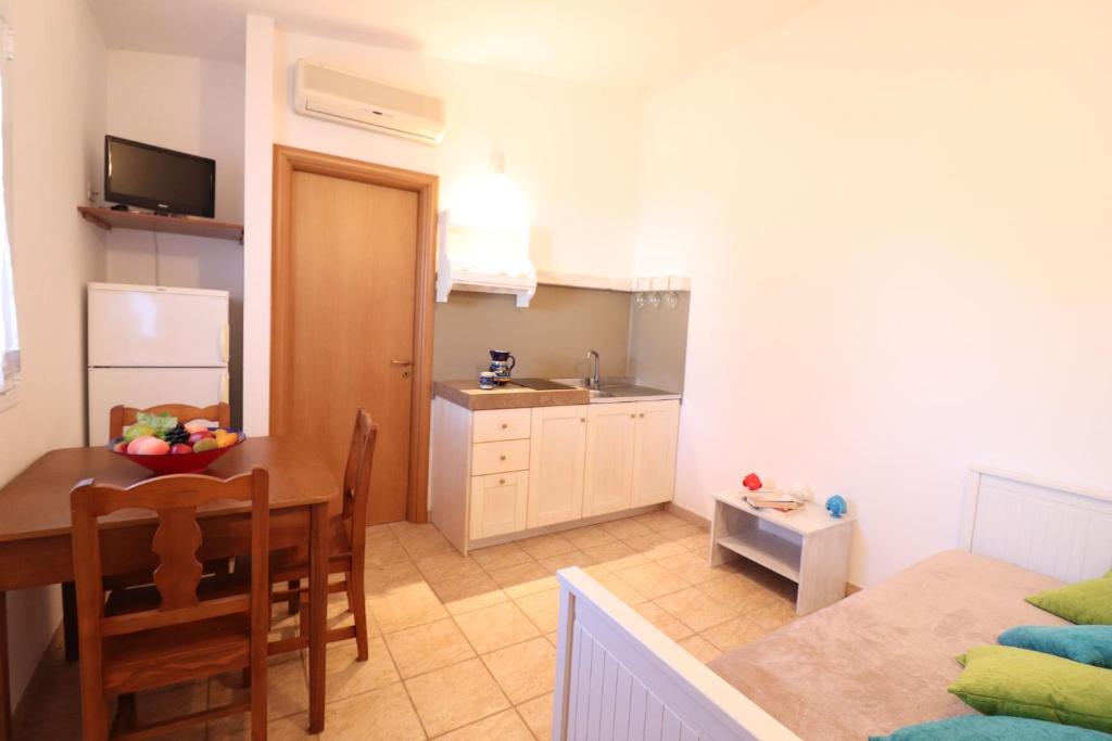 Kuchnia lub aneks kuchenny w obiekcie Casa Regina Residence Torre Santo Stefano in Otranto 3 places