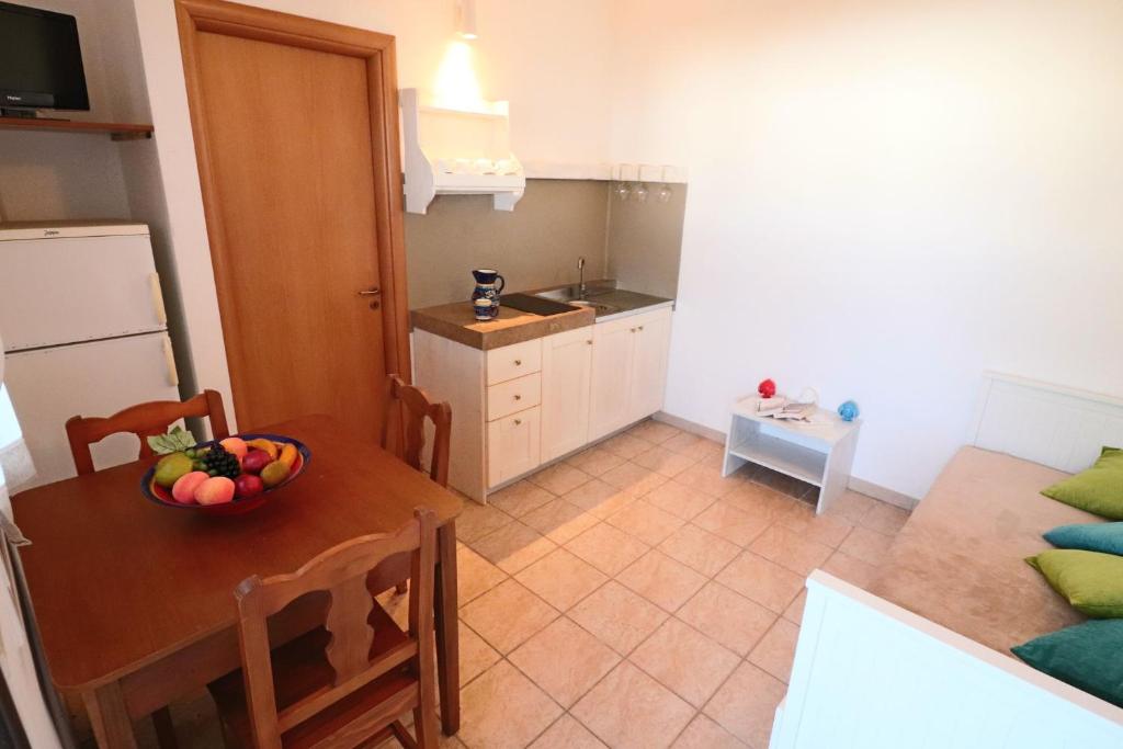Kuchnia lub aneks kuchenny w obiekcie Casa Regina Residence Torre Santo Stefano in Otranto 3 places