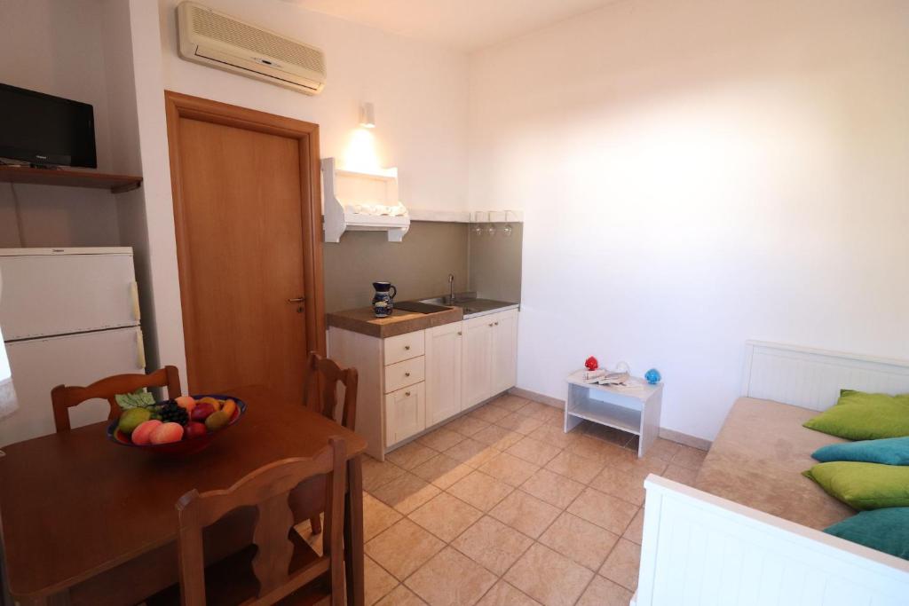 Kuchnia lub aneks kuchenny w obiekcie Casa Regina Residence Torre Santo Stefano in Otranto 3 places