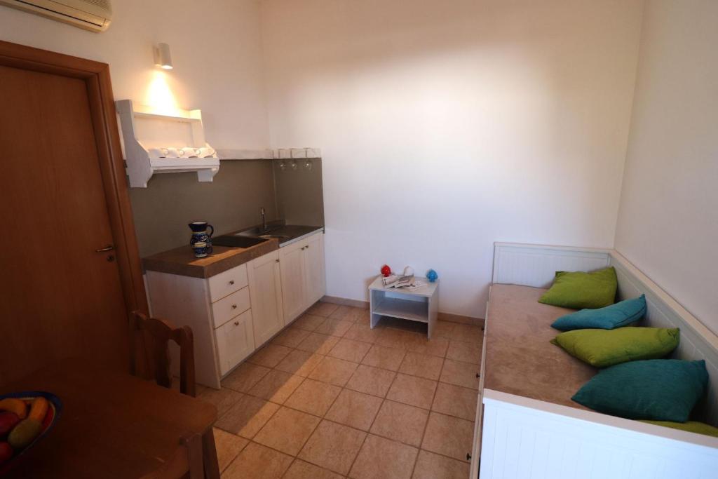 Kuchnia lub aneks kuchenny w obiekcie Casa Regina Residence Torre Santo Stefano in Otranto 3 places