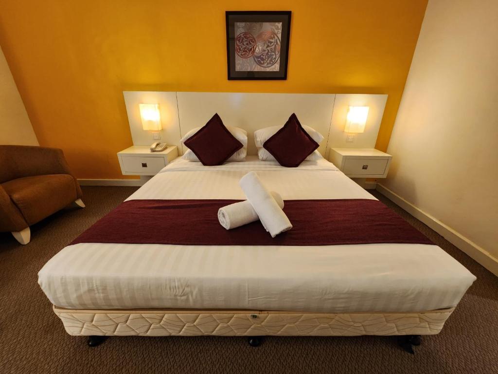 The Grand Puteri Hotel - Habitación Deluxe Con Cama Extragrande