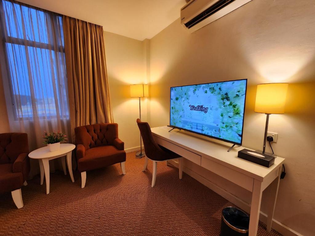 The Grand Puteri Hotel - Suite Júnior