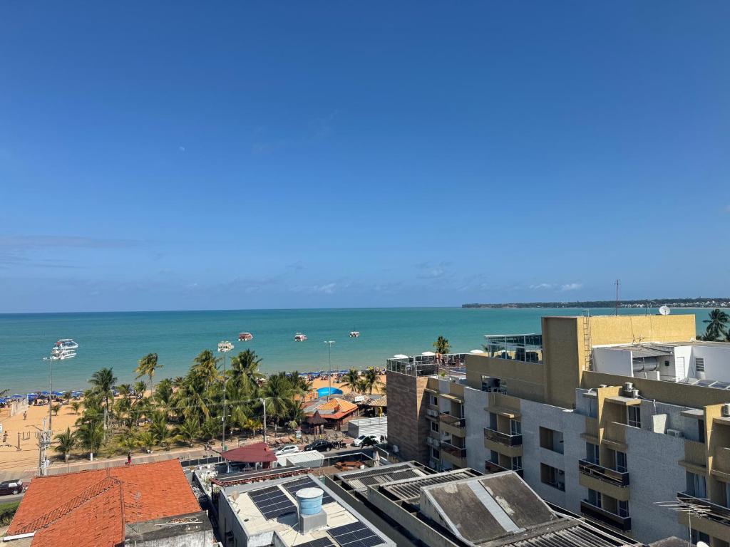 a view of the beach from a building at Tambaú Beach apartment in João Pessoa