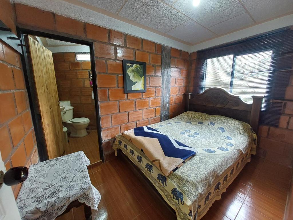 Postel nebo postele na pokoji v ubytování Hospedaje El Fresco
