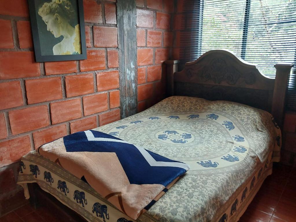 Postel nebo postele na pokoji v ubytování Hospedaje El Fresco