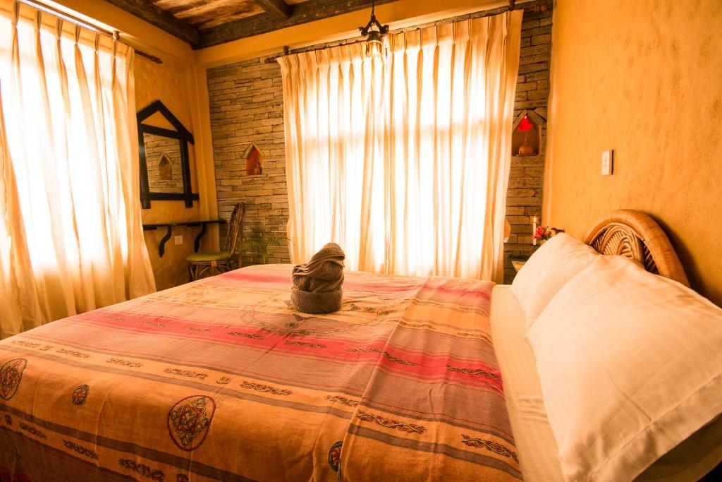 Letto o letti in una camera di Peace Eye Guest House