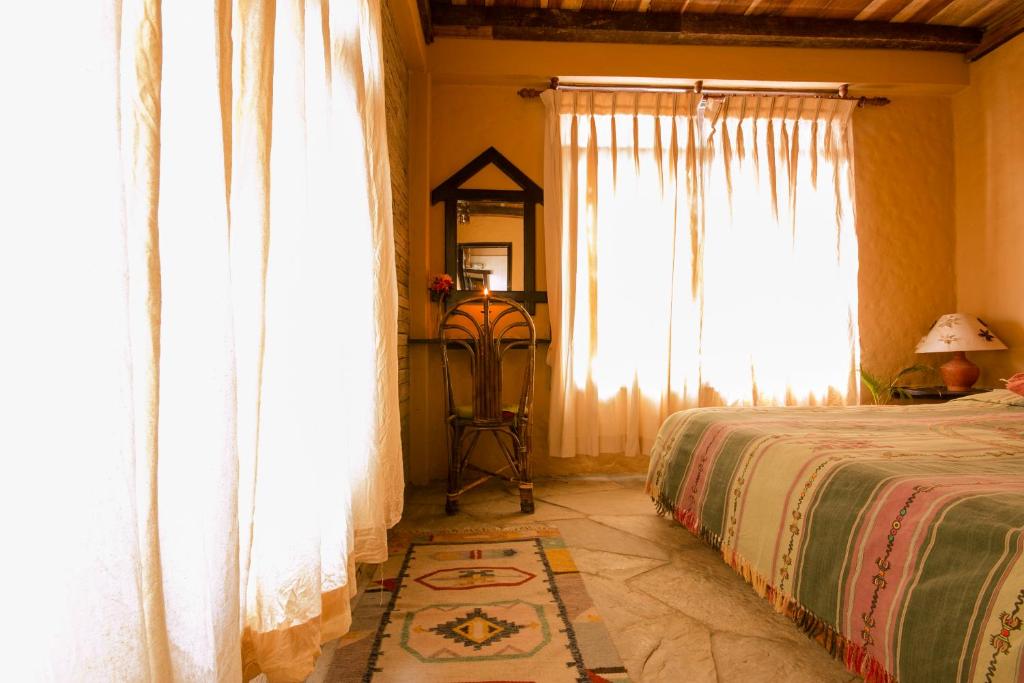 Letto o letti in una camera di Peace Eye Guest House