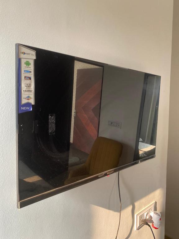 TV a/nebo společenská místnost v ubytování Royal Park Inn