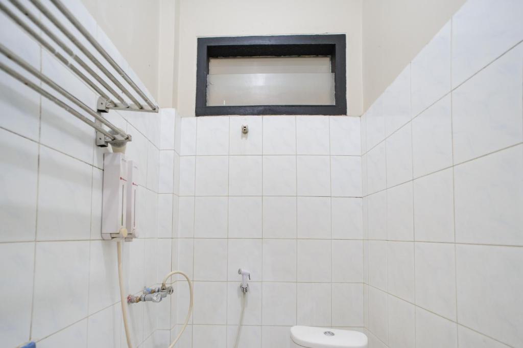 Koupelna v ubytování RedDoorz Plus @ Jalan Raden Intan Lampung