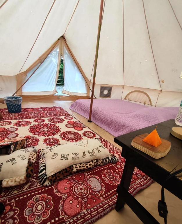 Postel nebo postele na pokoji v ubytování Glamping Xicotepec