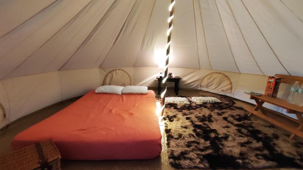 Postel nebo postele na pokoji v ubytování Glamping Xicotepec