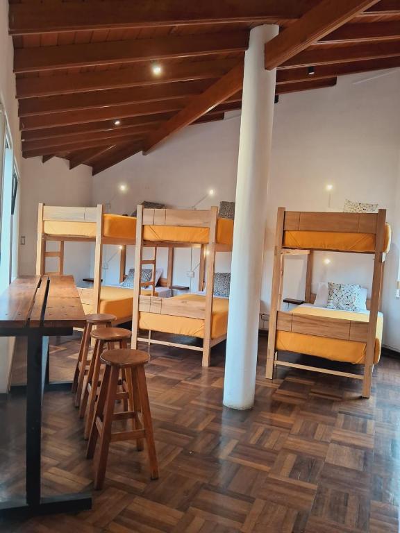 Postel nebo postele na pokoji v ubytování Temazcal Hostel