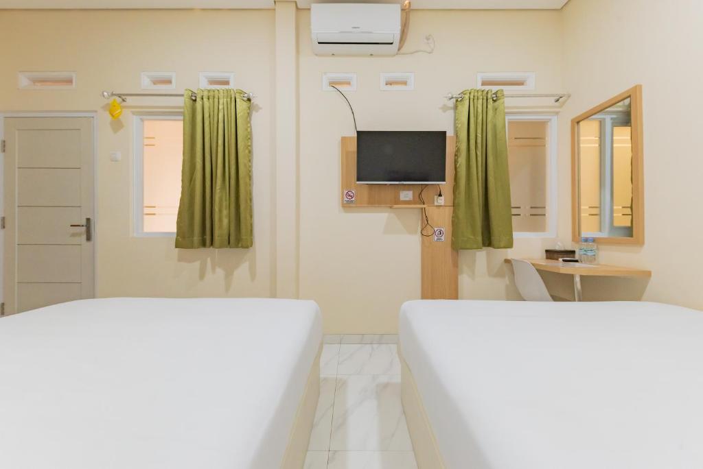 Urbanview Syariah Utami Inn Garut by RedDoorz - Suite