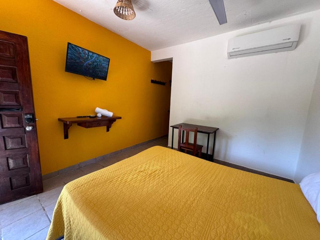 Postel nebo postele na pokoji v ubytování Casa Triz
