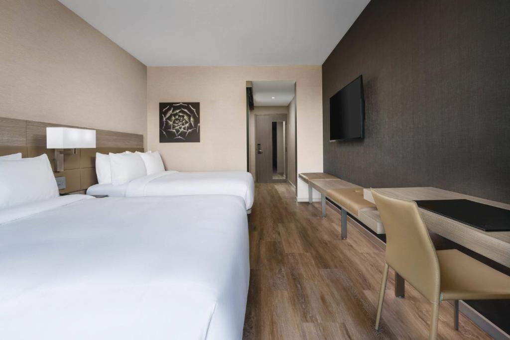 Postel nebo postele na pokoji v ubytování AC Hotel by Marriott Scottsdale North