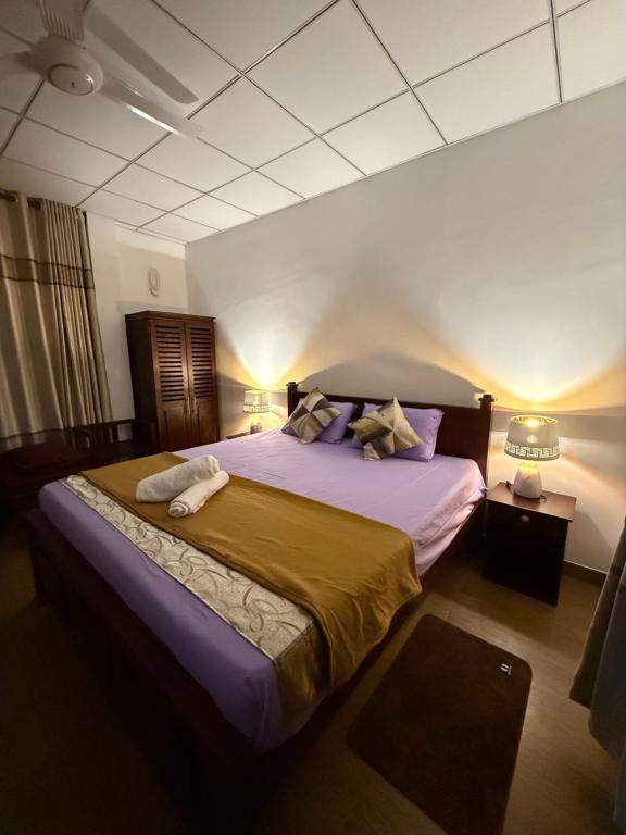 Postel nebo postele na pokoji v ubytování Ananda Rest-Ella