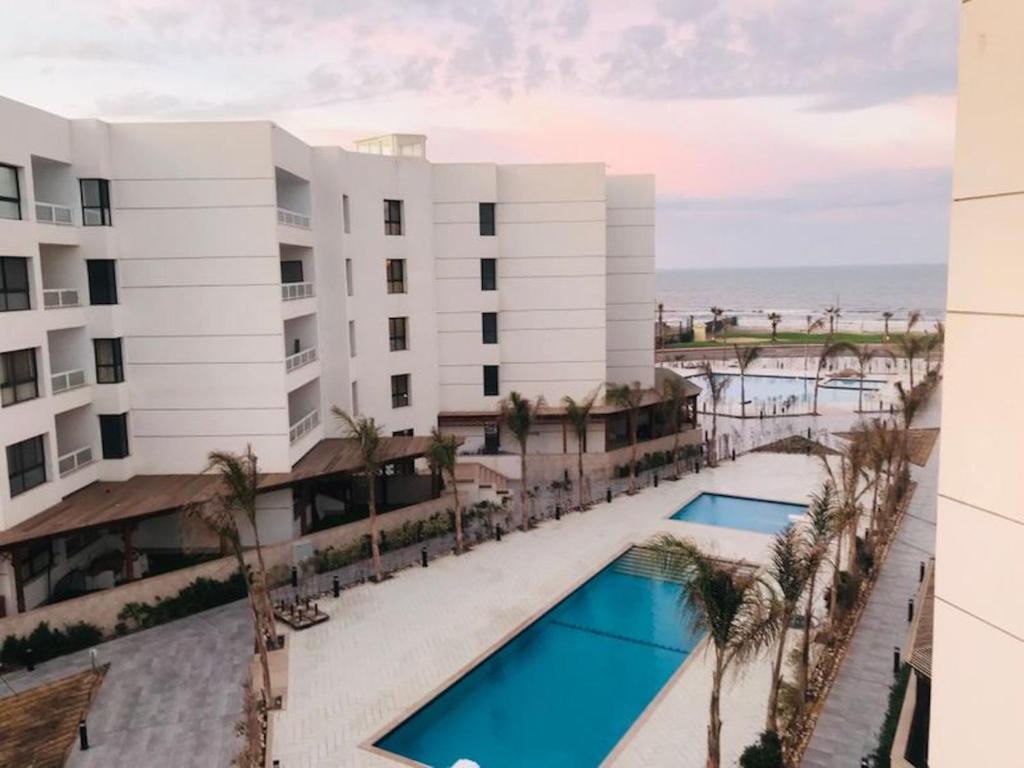 The swimming pool at or close to Porto Said Resort Rentals