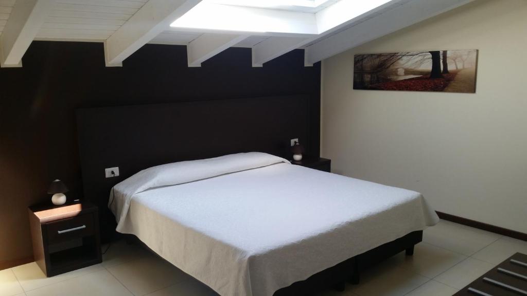 Postel nebo postele na pokoji v ubytování Residenza S.Event B&B