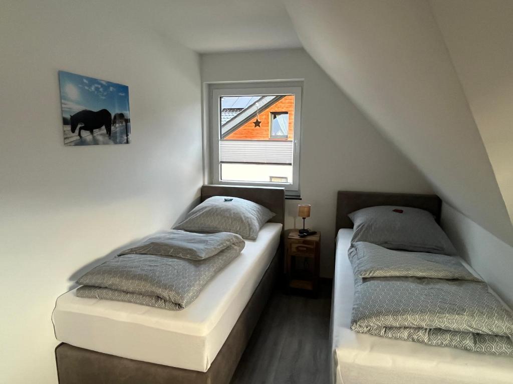 Postel nebo postele na pokoji v ubytování Rurseeparadies Kienert