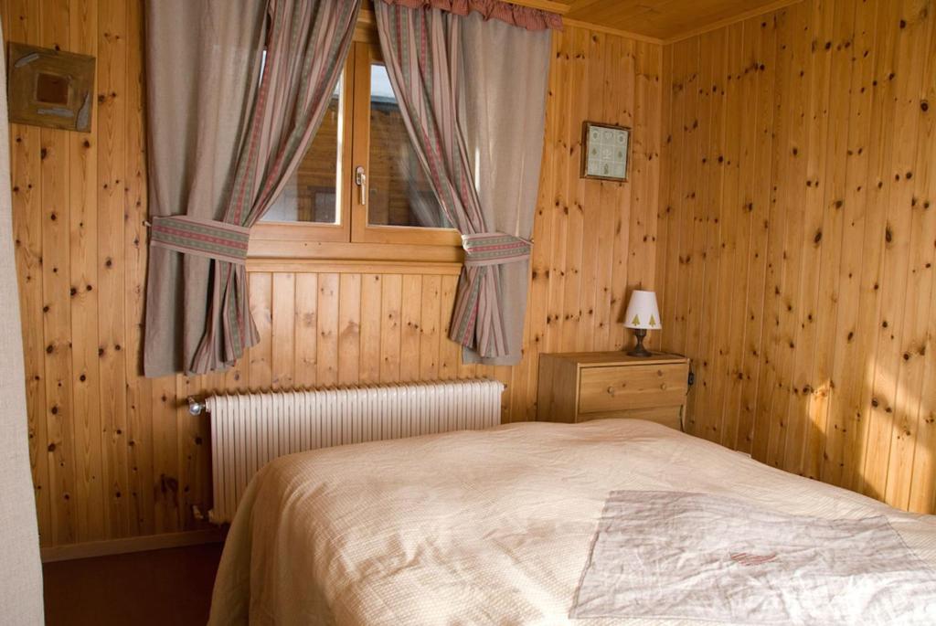 Postel nebo postele na pokoji v ubytování Outstanding chalet for groups, south facing, breathtaking views - all year round