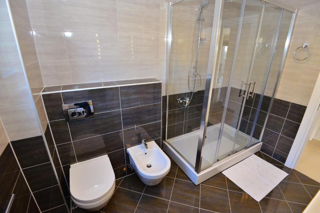 Kúpeľňa v ubytovaní Apartments Villa Coratina