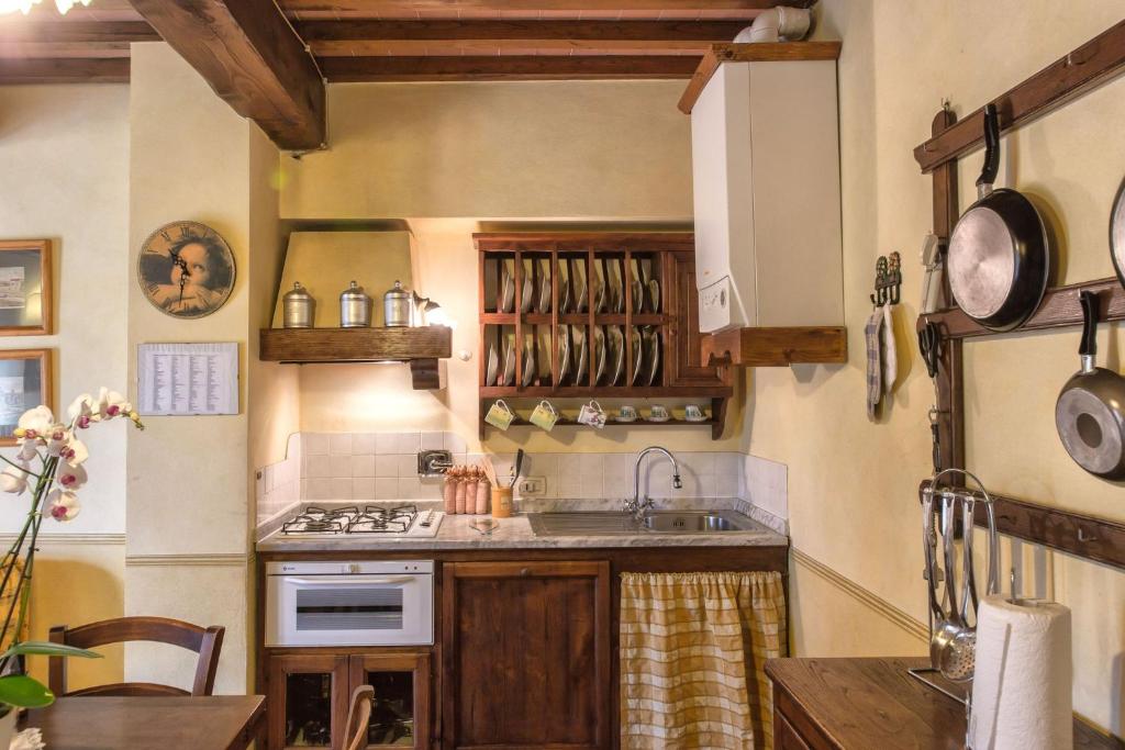 Kuchyňa alebo kuchynka v ubytovaní Residence Il Gavillaccio