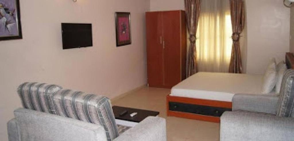 Postel nebo postele na pokoji v ubytování Room in Lodge - Royal View Hotel and Suites