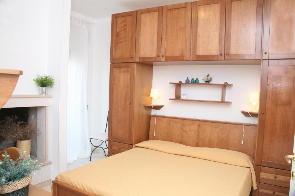 Postel nebo postele na pokoji v ubytování B&B Gelsimori