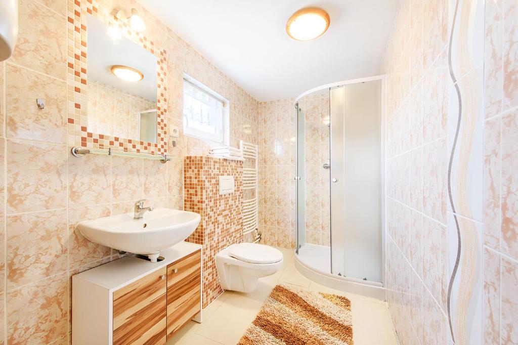 Kúpeľňa v ubytovaní Wellness Apartmány Andrea