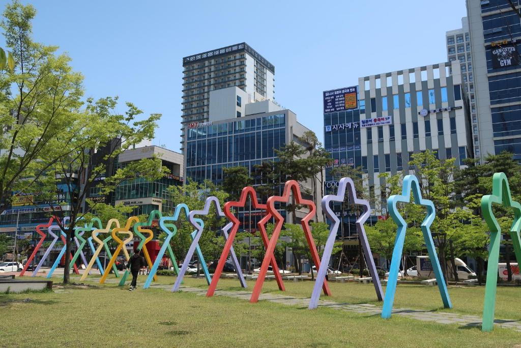 a display of scissors in a park in a city at Grand Bleu Hotel & Residence in Incheon