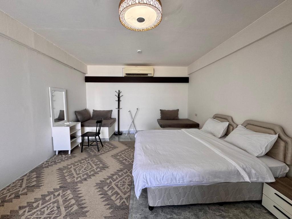 Voodi või voodid majutusasutuse Wadi Shab Beach Villa toas