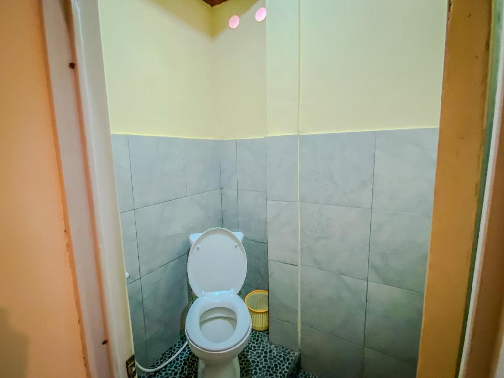 Koupelna v ubytování D'ulun Carik Homestay